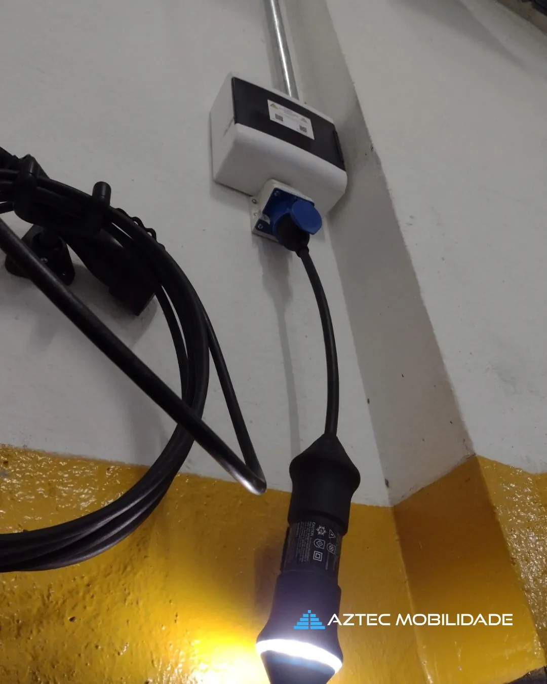 Tomada para carro elétrico